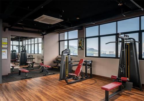 Fitnesscentret og/eller fitnessfaciliteterne på Cozy Stylish Iconic Regency #FTZ#Queensbay#Airport
