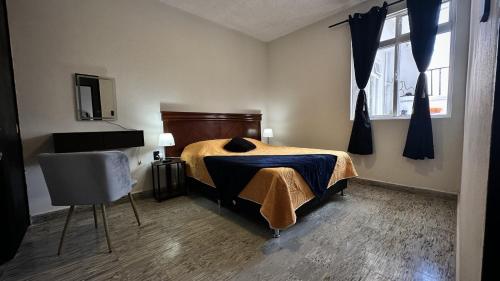 Ένα ή περισσότερα κρεβάτια σε δωμάτιο στο DCalli Next to the Alameda, terrace and confort