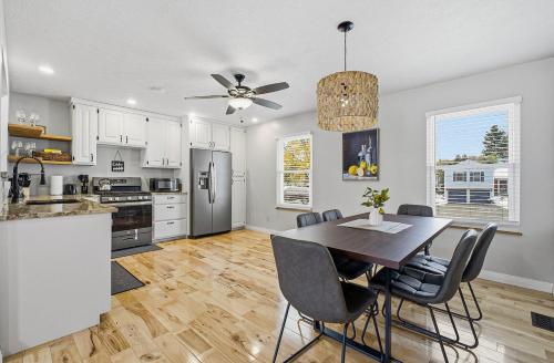 a kitchen and dining room with a table and chairs at New 3br home Ready for the Holidays in Dublin