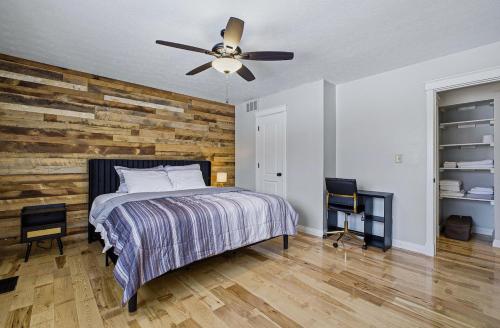 a bedroom with a bed and a ceiling fan at New 3br home Ready for the Holidays in Dublin