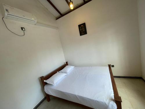 Кровать или кровати в номере Chanu Villa