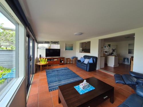 a living room with a couch and a table at Relax in San Remo Pets Welcome in San Remo