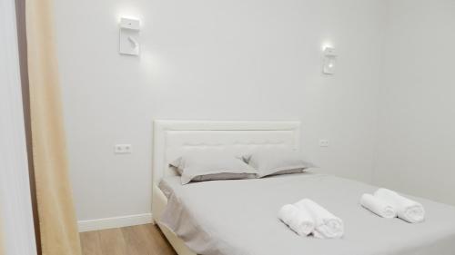 Voodi või voodid majutusasutuse Dauletti Qalashyq toas