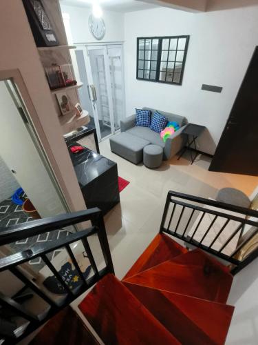 an aerial view of a living room with a couch at Kira Villa in Tlekung