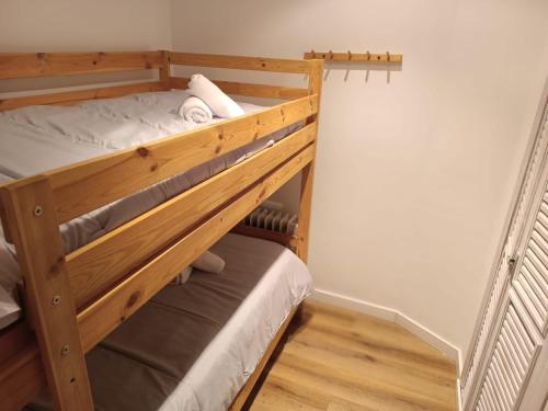 Voodi või voodid majutusasutuse Ático Montblanc Zona Baja toas