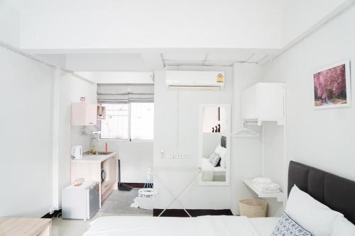 Kuchyň nebo kuchyňský kout v ubytování Baan Ploy Inn 2