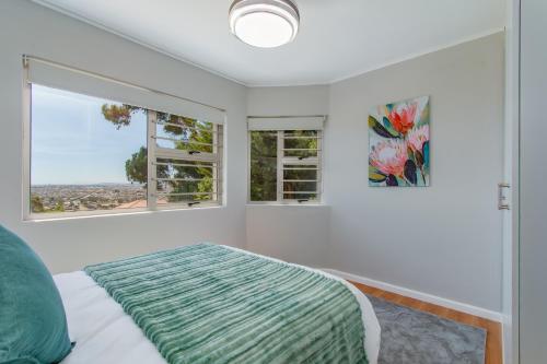 Ένα ή περισσότερα κρεβάτια σε δωμάτιο στο 75 on Chapman