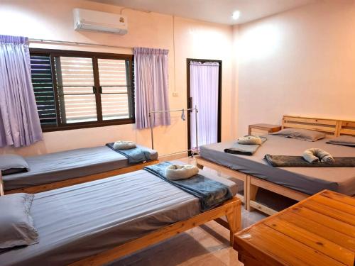 Postel nebo postele na pokoji v ubytování Padang Besar Border Private room & Hostel