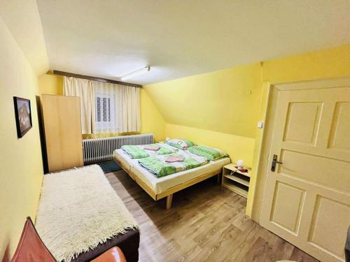 Llit o llits en una habitació de Vila Zdenka
