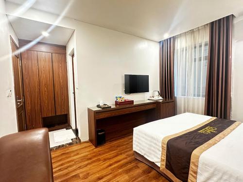 Et tv og/eller underholdning på THANH LAM Hotel- KĐT Bắc Linh Đàm