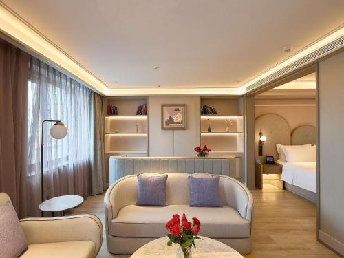 Postel nebo postele na pokoji v ubytování Mercure Beijing Anzhen Olympic Center