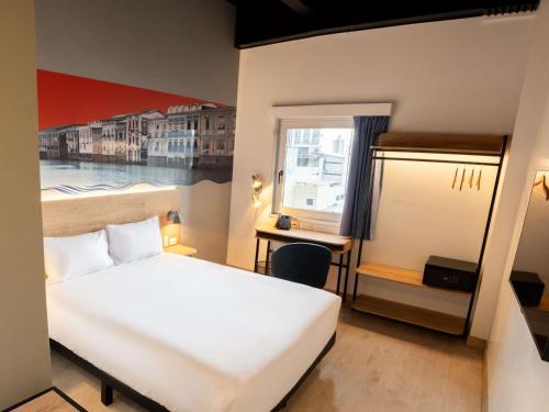 En eller flere senge i et værelse på Ibis Styles El Malecon Guayaquil