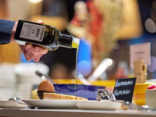 Nápoje v ubytování Aparthotel Adagio Access Rouen Centre Cathédrale