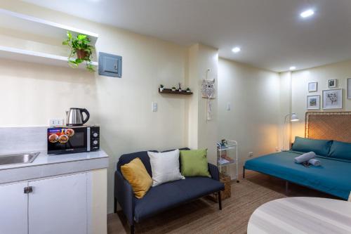 Η κουζίνα ή μικρή κουζίνα στο Aesthetic Boho Studio Near Maginhawa & UP