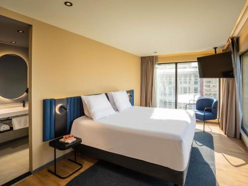 Una cama o camas en una habitación de Novotel México City Centro Histórico