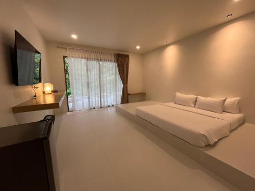 Ένα ή περισσότερα κρεβάτια σε δωμάτιο στο khaolakcamping