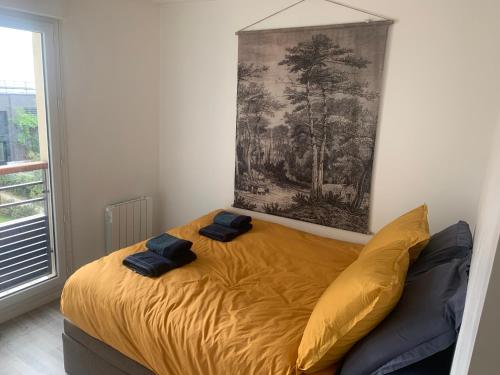 Ένα ή περισσότερα κρεβάτια σε δωμάτιο στο Calme et Sérénité