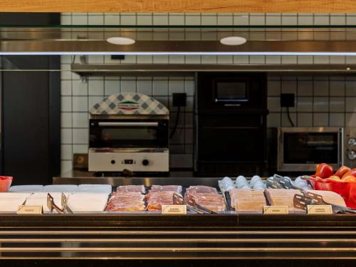 Kuchyň nebo kuchyňský kout v ubytování ibis budget Madrid Aeropuerto