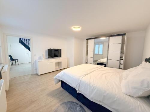 Voodi või voodid majutusasutuse Modernes Haus direkt am Rhein toas