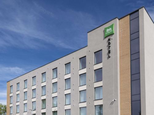 a building with a sign on the side of it at ibis Styles Burton On Trent in Burton upon Trent