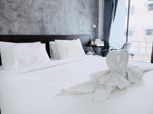 Ένα ή περισσότερα κρεβάτια σε δωμάτιο στο The Sense