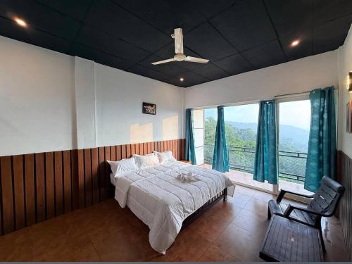 Ένα ή περισσότερα κρεβάτια σε δωμάτιο στο HillviewHOMESTAY