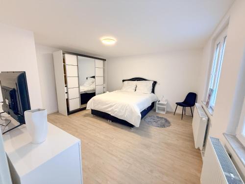 Voodi või voodid majutusasutuse Modernes Haus direkt am Rhein toas