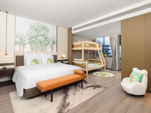 Postel nebo postele na pokoji v ubytování Pullman Taizhou Shenxianju