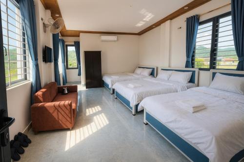 Ένα ή περισσότερα κρεβάτια σε δωμάτιο στο 26 Hotel Mộc Châu