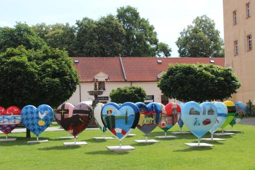 a display of heart shaped balloons in a field at Apartment Promenada in Poděbrady
