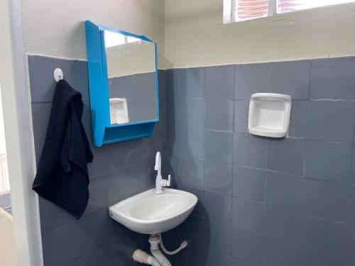 Un baño de Casa aconchegante próximo ao parque ecológico