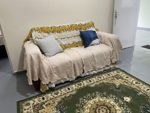 Una cama o camas en una habitación de Casa aconchegante próximo ao parque ecológico