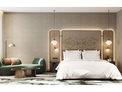 Ένα ή περισσότερα κρεβάτια σε δωμάτιο στο Swissôtel Marianske Lazne