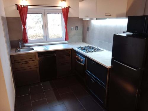 Köök või kööginurk majutusasutuses Wellness chata BABÍ VRCH