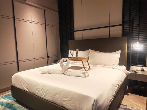 Postel nebo postele na pokoji v ubytování Antara Genting Highland premium Suite by ImooHome