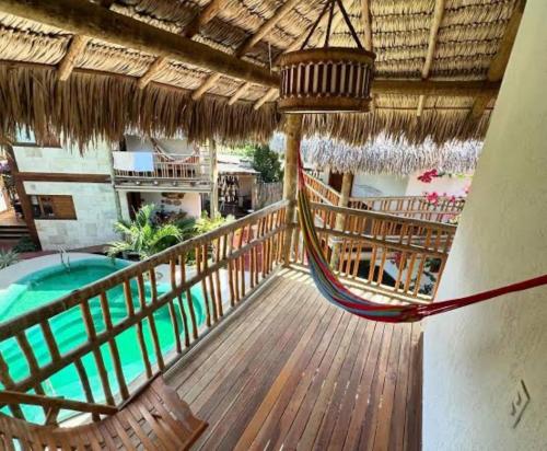 Swimmingpoolen hos eller tæt på Casa Vila Tamarindo Barra Grande