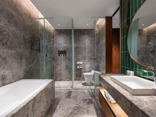 Ένα μπάνιο στο Novotel Shanghai Baoshan Jiusi