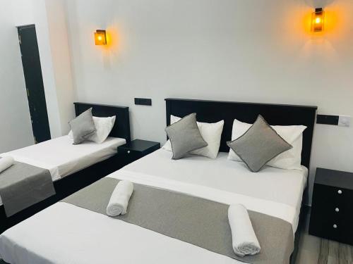 Postel nebo postele na pokoji v ubytování Sinharaja Eliphinity Hotel and Restaurant