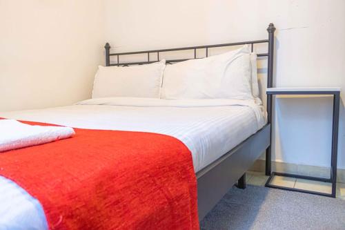 Ένα ή περισσότερα κρεβάτια σε δωμάτιο στο Nanyuki Mostays