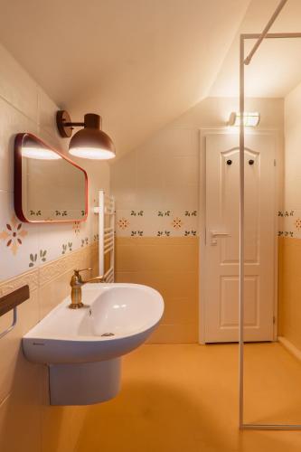 a bathroom with a sink and a mirror at Kuker Hut - Хижа Кукер in Sofia