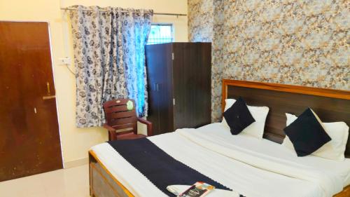 Un ou plusieurs lits dans un hébergement de l'établissement Lake View