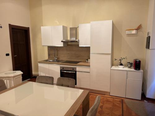 Kuchyň nebo kuchyňský kout v ubytování Loft 84