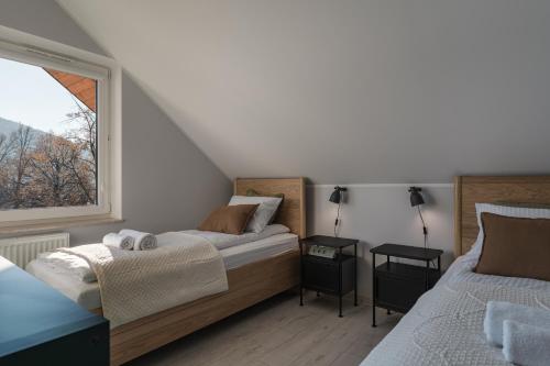 Ένα ή περισσότερα κρεβάτια σε δωμάτιο στο Apartament Sauna Loft