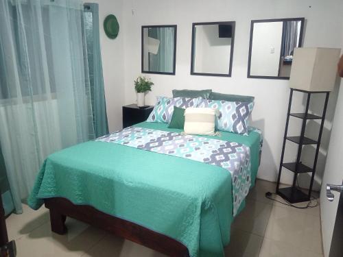 Ένα ή περισσότερα κρεβάτια σε δωμάτιο στο Fruta de mango #2