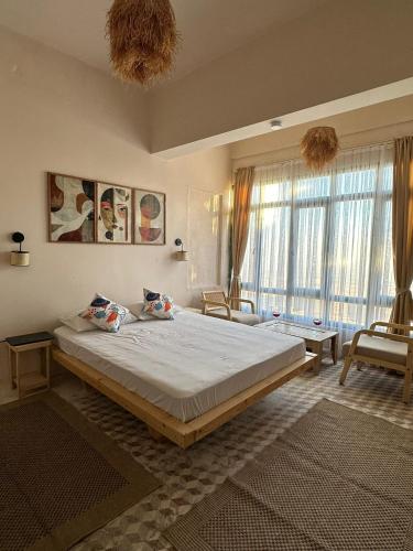 Postel nebo postele na pokoji v ubytování Mihre Konağı