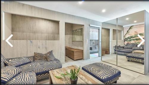 a living room with couches and a table at Ferienwohnung 1 neu Speyer in Speyer