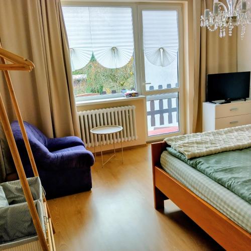 Ένα ή περισσότερα κρεβάτια σε δωμάτιο στο Penzion Frederika