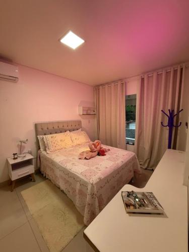 Ένα ή περισσότερα κρεβάτια σε δωμάτιο στο Casa completa e climatizada em Ilhéus