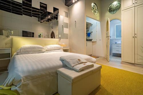 Ένα ή περισσότερα κρεβάτια σε δωμάτιο στο Luxury Trevi