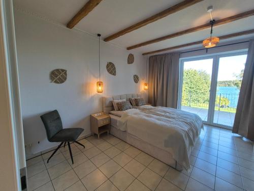 Ένα ή περισσότερα κρεβάτια σε δωμάτιο στο Monteurzimmer 6 mit Seeblick